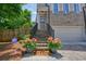 Home's inviting entrance with landscaped steps and a warm 'hello' doormat at 2093 Callaway Nw Ct, Atlanta, GA 30318