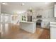Well-lit kitchen with stainless steel appliances, a large island, and hardwood floors, perfect for entertaining at 2093 Callaway Nw Ct, Atlanta, GA 30318