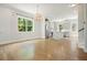 Bright living room with hardwood floors leading to a modern kitchen at 2093 Callaway Nw Ct, Atlanta, GA 30318