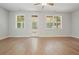 Open concept living area featuring hardwood floors, neutral paint and lots of natural light at 2093 Callaway Nw Ct, Atlanta, GA 30318