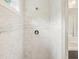 Modern shower stall featuring marble-look tile and a clean, minimalist design at 2093 Callaway Nw Ct, Atlanta, GA 30318