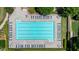 Aerial view of a large community pool with plenty of lounge chairs for relaxing at 2093 Callaway Nw Ct, Atlanta, GA 30318