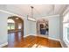 Dining room showcasing hardwood floors and an open view to the kitchen at 219 Brick Mill Dr, Canton, GA 30115