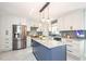 Modern kitchen with stainless steel appliances, a kitchen island and ample cabinet space at 219 Brick Mill Dr, Canton, GA 30115