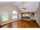 Bright living room with hardwood floors, a ceiling fan and lots of light at 219 Brick Mill Dr, Canton, GA 30115