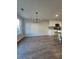 Spacious dining room with chandelier and vinyl flooring is ready for entertaining at 28 Samuel Nw Way, Cartersville, GA 30121