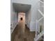 Inviting foyer featuring hardwood floors, white wainscoting, and a staircase leading to the upper level at 28 Samuel Nw Way, Cartersville, GA 30121