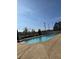 Community pool with concrete surround, perfect for relaxing on a sunny day at 28 Samuel Nw Way, Cartersville, GA 30121