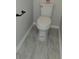 Bathroom featuring modern toilet and wood look tile floor at 28 Samuel Nw Way, Cartersville, GA 30121