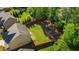 Expansive backyard featuring a well-maintained lawn, surrounded by a privacy fence and mature trees at 4830 Frontier Dr, Cumming, GA 30028