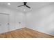 Modern bedroom featuring hardwood floors, ceiling fan, natural light and double door closet at 90 Cleveland Unit A Se St, Atlanta, GA 30316