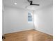 Bright bedroom featuring hardwood floors, a ceiling fan, neutral paint, and natural light from a window at 90 Cleveland Unit A Se St, Atlanta, GA 30316