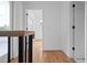 Upstairs hallway with hardwood floors and access to outdoor patio at 90 Cleveland Unit A Se St, Atlanta, GA 30316