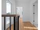 Upstairs hallway with hardwood floors and access to outdoor patio at 90 Cleveland Unit A Se St, Atlanta, GA 30316