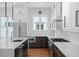 Bright kitchen showcasing an island, stainless steel appliances, and modern cabinetry at 90 Cleveland Unit A Se St, Atlanta, GA 30316