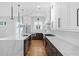 Modern kitchen design showcasing an island, stainless steel appliances, and white tile backsplash at 90 Cleveland Unit A Se St, Atlanta, GA 30316