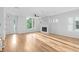 Bright living room with hardwood floors and a modern fireplace at 90 Cleveland Unit A Se St, Atlanta, GA 30316