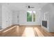 Bright living room with hardwood floors and a modern fireplace at 90 Cleveland Unit A Se St, Atlanta, GA 30316