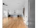 Open-concept living space flows into a spacious kitchen, hardwood flooring throughout at 90 Cleveland Unit A Se St, Atlanta, GA 30316