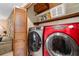 Modern laundry room with new washer and dryer units for efficient home care at 140 N Star Sw Trl, Atlanta, GA 30331