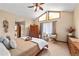 Serene main bedroom with vaulted ceilings, unique windows, and neutral tones at 140 N Star Sw Trl, Atlanta, GA 30331