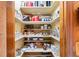 This well-organized pantry offers plenty of storage space with shelving, perfect for kitchen essentials at 140 N Star Sw Trl, Atlanta, GA 30331