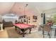 A spacious basement is an entertainer's dream, featuring a pool table, media area and game tables at 2425 Wild Oak Ct, Stockbridge, GA 30281