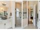 Bathroom featuring a separate shower and and sinks, and framed mirrors at 2425 Wild Oak Ct, Stockbridge, GA 30281