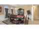 Refined dining room showcasing a table with seating for six and elegant wainscoting at 2425 Wild Oak Ct, Stockbridge, GA 30281