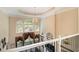 Grand foyer with large windows, a decorative chandelier, and a view of the entry at 2425 Wild Oak Ct, Stockbridge, GA 30281