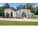 Breathtaking brick home features a grand entrance, manicured lawn, and an inviting driveway at 2425 Wild Oak Ct, Stockbridge, GA 30281