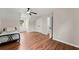 Bedroom featuring a ceiling fan, wood look floors and good natural light at 2979 Overwood Sw Ln, Snellville, GA 30078