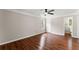 Bright bedroom with hardwood floors, large windows, and ceiling fan at 2979 Overwood Sw Ln, Snellville, GA 30078