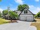 A lovely two-story residence featuring a welcoming porch and a convenient two-car garage, designed for comfort at 2979 Overwood Sw Ln, Snellville, GA 30078