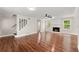 Bright living room with beautiful floors, a cozy fireplace, and ample space for relaxation and entertainment at 2979 Overwood Sw Ln, Snellville, GA 30078