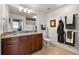 Well-lit bathroom with granite countertops, ample storage, and contemporary fixtures at 3300 Windy Ridge Se Pkwy # 1401, Atlanta, GA 30339