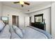 Bedroom featuring a large window with hardwood floors, and contemporary furniture at 3300 Windy Ridge Se Pkwy # 1401, Atlanta, GA 30339