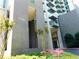 Modern building exterior with a prominent address number, complemented by beautiful landscaping and architectural details at 3300 Windy Ridge Se Pkwy # 1401, Atlanta, GA 30339