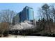 Exterior view of a high-rise building with balconies and modern design at 3300 Windy Ridge Se Pkwy # 1401, Atlanta, GA 30339