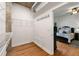 Walk-in closet featuring wire shelving and a glimpse into the bedroom at 3300 Windy Ridge Se Pkwy # 1401, Atlanta, GA 30339
