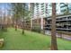 A community dog park and fenced area for residents to exercise pets, near garage parking at 3300 Windy Ridge Se Pkwy # 1401, Atlanta, GA 30339