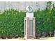 Attractive brick Cumberland community entrance sign surrounded by lush greenery and landscaping at 3300 Windy Ridge Se Pkwy # 1401, Atlanta, GA 30339