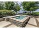 Outdoor hot tub with stone surround, providing a relaxing experience at 3300 Windy Ridge Se Pkwy # 1401, Atlanta, GA 30339