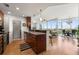 Modern kitchen featuring granite countertops and sleek wooden cabinetry, seamlessly flowing into the living space at 3300 Windy Ridge Se Pkwy # 1401, Atlanta, GA 30339