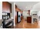 Modern kitchen with stainless steel appliances, dark wood cabinets, and a built-in desk area at 3300 Windy Ridge Se Pkwy # 1401, Atlanta, GA 30339