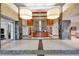 Grand lobby featuring a modern reception desk, stone accents, and elegant lighting fixtures at 3300 Windy Ridge Se Pkwy # 1401, Atlanta, GA 30339