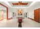 Elegant lobby with a granite table, decorative art, and high ceilings with modern lighting at 3300 Windy Ridge Se Pkwy # 1401, Atlanta, GA 30339