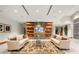 Comfortable resident lounge with sofas, large screen TV, and custom shelving at 3300 Windy Ridge Se Pkwy # 1401, Atlanta, GA 30339