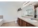Bathroom showcasing a double sink vanity and a soaking tub at 632 Warren Ave, Scottdale, GA 30079