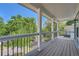 Spacious outdoor porch provides an outdoor view of the neighborhood street at 632 Warren Ave, Scottdale, GA 30079
